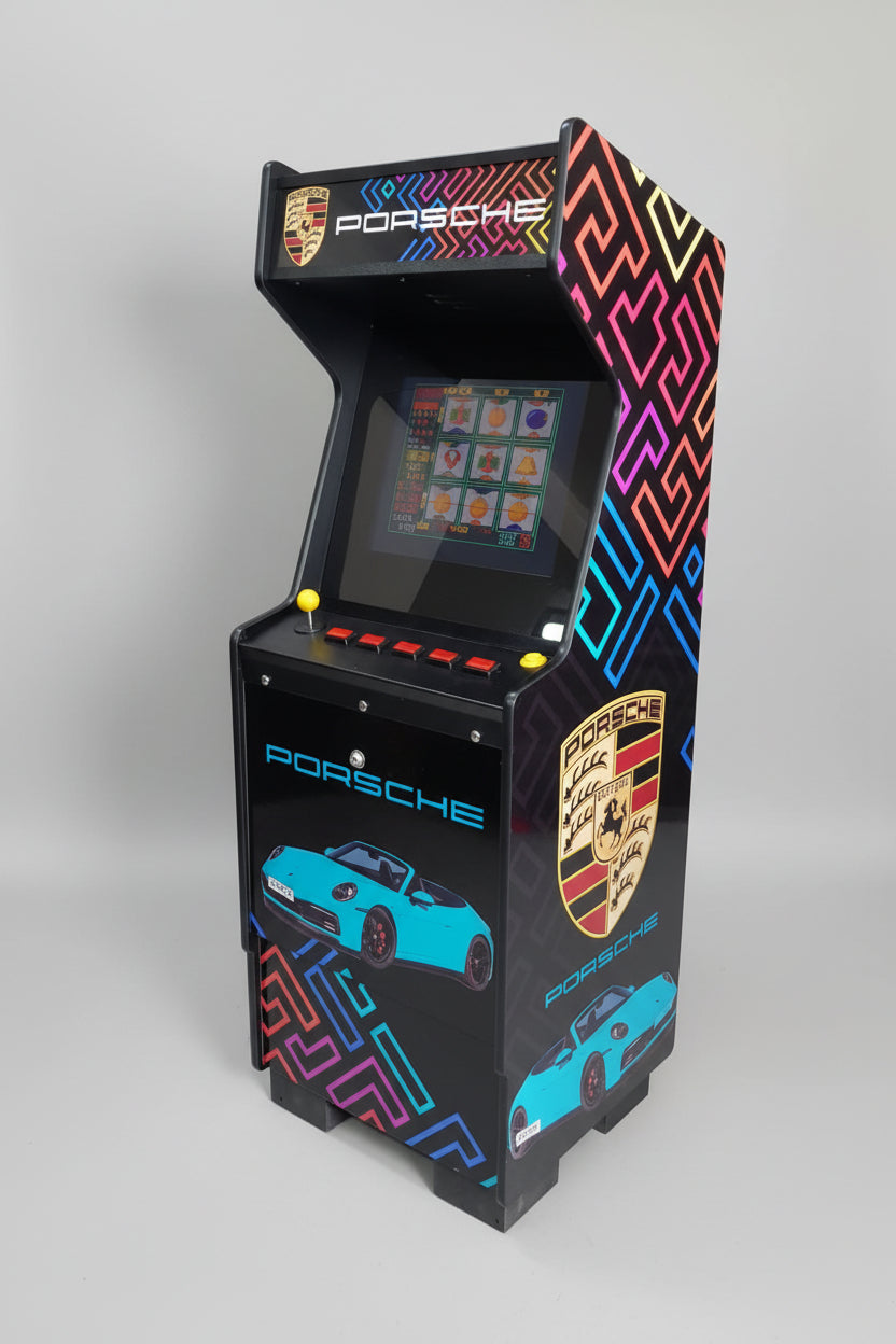Arcade machine with Porsche branding in an arcade setting